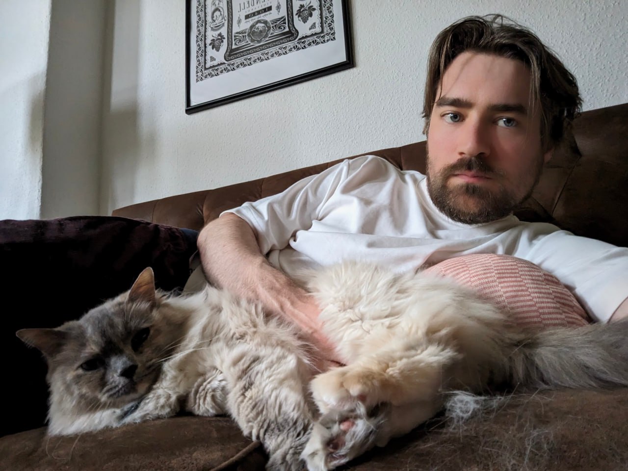 David Hartery at home in Berlin with his cat